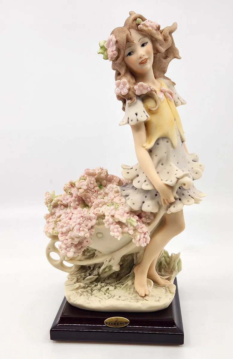 GIRL WITH WHEEL BARROW by Giuseppe Armani — Sculpture