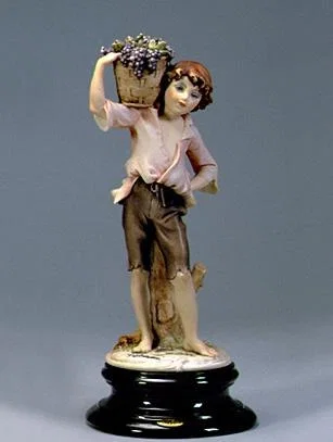 Boy with Grapes by Giuseppe Armani — Sculpture