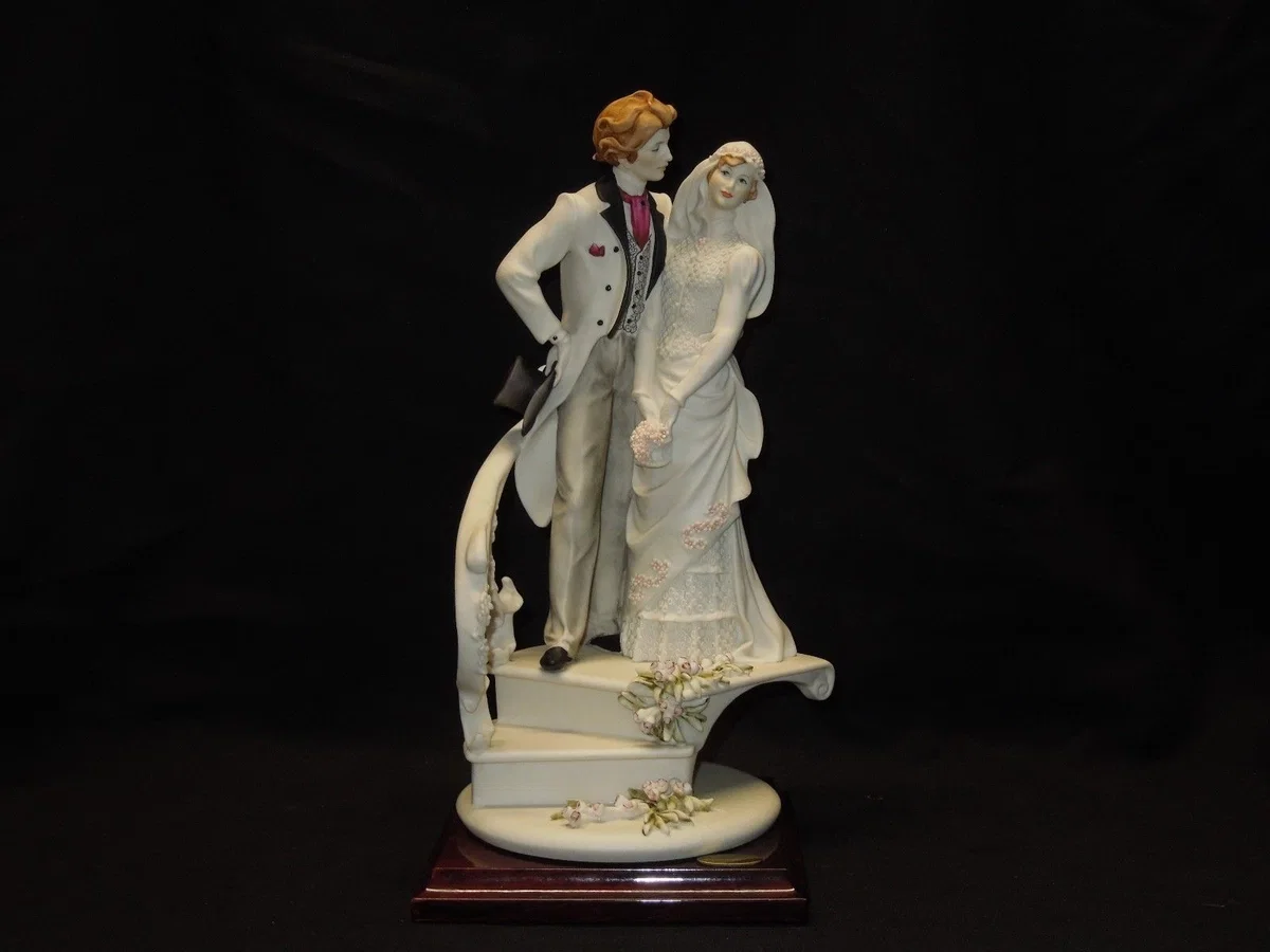 Bride And Groom On Stairs by Giuseppe Armani — Sculpture