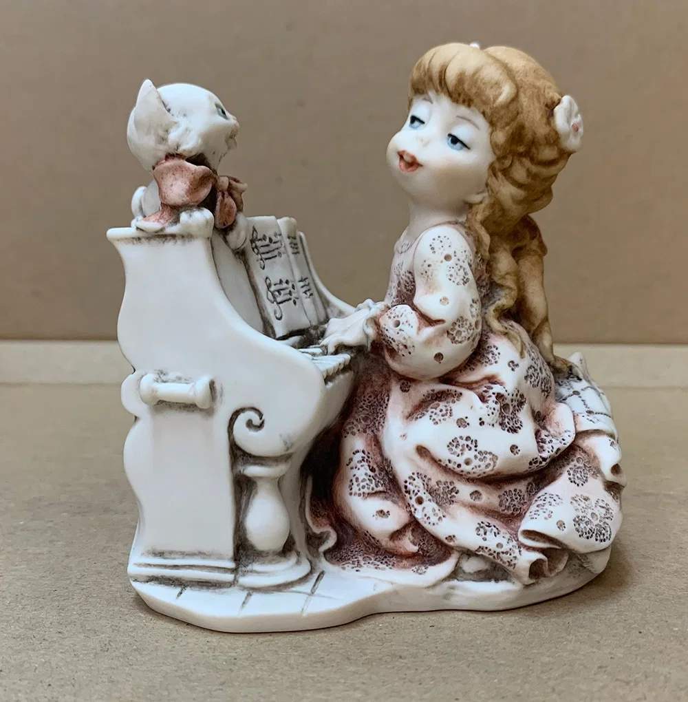 PLAYING THE PIANO by Giuseppe Armani — Sculpture