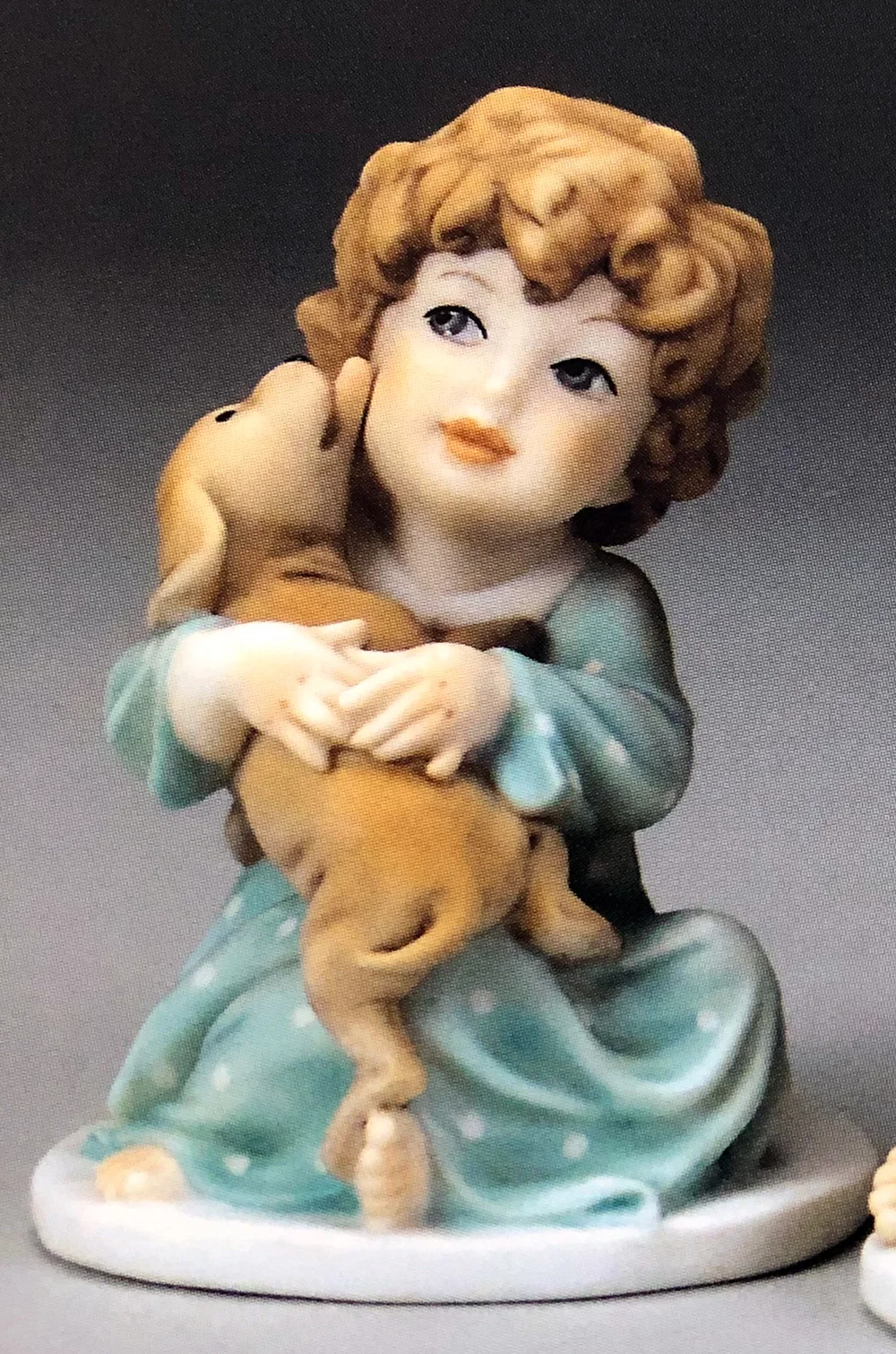 SITTING BOY WITH DOG by Giuseppe Armani — Sculpture
