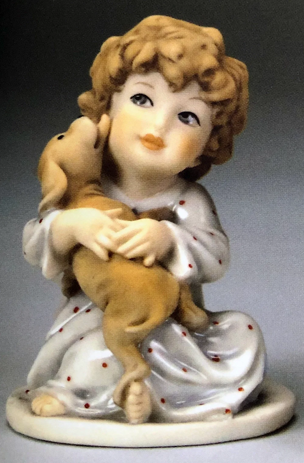 SITTING BOY WITH DOG by Giuseppe Armani — Sculpture