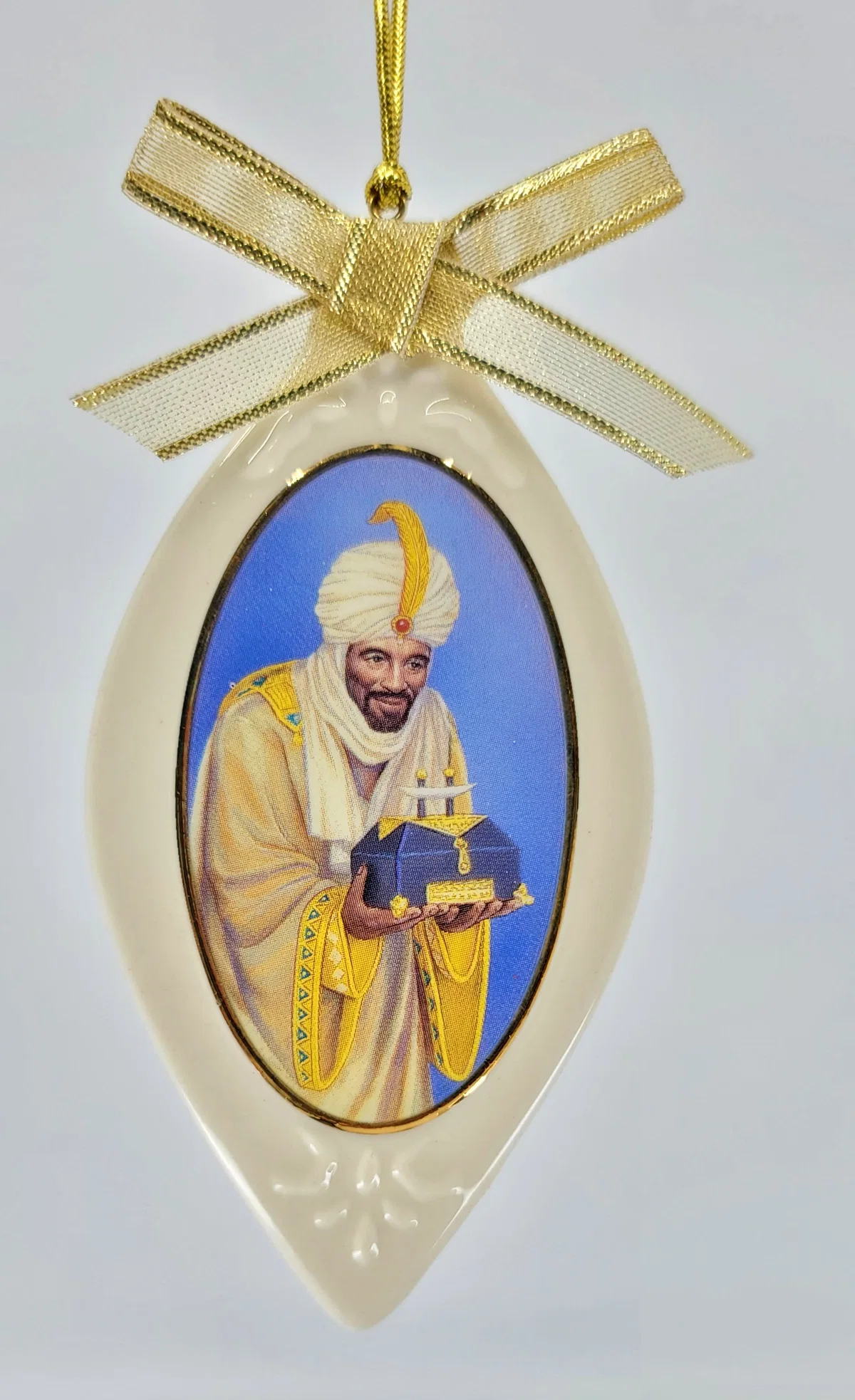 Wise Man With Gold Ornament by Ebony Visions